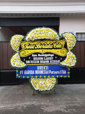 Papan Bunga Duka di Katulisan