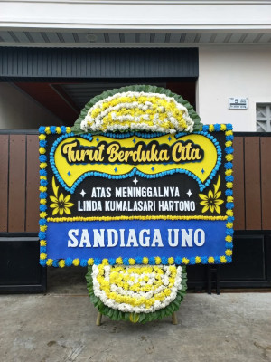 Papan Bunga Duka di Katulisan